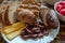 Close up of cheese and meat platter with sourdough bread