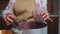 Close-up. Chef confectioner, housewife bottling jam into sterilized glass jars