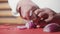 Close-up of chef hands cooking and preparing food in restaurant open kitchen. Slow Motion. A delicious gourmet meal is