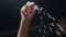 Close-up of a chef`s hand salting a dish