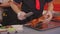 Close-up of chef\\\'s hands slicing Peking duck