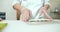 Close up of chefs male hands in gloves cooking sushi rolls in the kitchen