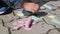 A close-up of a child draws the flag of Ukraine with chalk. Slow motion