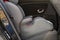 Close-up of child mobile comfortable chair seat in car interior. Transportation, design, security, safety and life protection