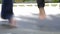 Close Up Of Children\'s Feet Jumping On Trampoline