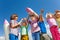 Close-up of children stand with paper rocket toy