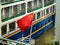 Close up of chinese flag flying in front of Yangtze river boat