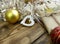 Close up Christmas decoration with gift, baubles and tinsel on wooden background.