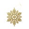 Close up christmas decoration golden snowflake isolated on white background