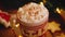 Close-up of a Christmas mug with cocoa with marshmallows and cinnamon