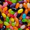 Close up of Cinema colorful assorted jelly beans in a full screen tile image that can be repeated infinitely