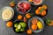 Close up of citrus in bowls fruits on stone table