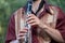 Close up of clarinet player playing at a Klezmer concert of Jewish fusion music in Regent`s Park in London