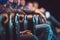 Close-up of the clasped male hands sitting on a leather chair. the speaker is waiting for his turn at the business