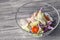 Close-up of a classic Caesar salad with chicken, iceberg lettuce, croutons, tomatoes, Chinese cabbage. Concept professional food