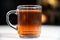 Close up of clear glass cup mug of rich fresh ceylon black tea