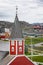 Close up of the clock tower of the iconic red wood Church of our Saviour in Nuuk, Greenland