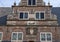 Close up of coat of arms and gable stone, The Town Hall of De Rijp, Netherlands