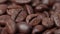 Close up of coffee beans rotating background