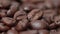 Close up of coffee beans rotating background