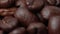 Close up of coffee beans rotating background