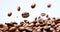 Close up on coffee beens flying on a white background