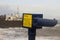 A close up of a coin operated telescope in a strong metal casing on the North Pier in Bangor County Down