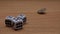 Close up of coins and dices on wooden background