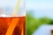 Close-Up Of Cold Glass Of Aperol Spritz With Condensation