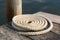 Close Up of a Colied Nautical Rope on a Wooden Pier