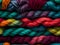 close up colored threads on a dark background