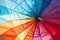 A close-up of a colorful afternoon beach umbrella
