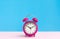 Close up colorful alarm clock on pastel background.timing concepts