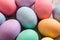 Close up of Colorful Easter Egge on Wood Background