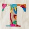 A close up of a colorful embroidered letter t