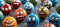 Close up of colorful emoji balls showcasing diverse emotions in a vibrant assortment