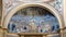 Close-up on colorful fresco decorating a catholic church in Rome