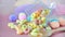 Close up Colorful Fruit Loops on Pastel Background