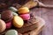 Close up colorful macarons dessert with vintage pastel tones