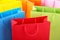 Close up of colorful paper shopping bags