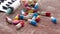Close up of colorful pills and syringe on wooden background
