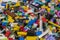 Close up of colorful plastic bricks on the floor. Early learning. Children\'s plastic constructor on the floor. background