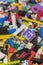 Close up of colorful plastic bricks on the floor. Early learning. Children\'s plastic constructor on the floor. background.