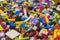 Close up of colorful plastic bricks on the floor. Early learning. Children\'s plastic constructor on the floor. background