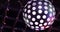 Close up colorful rotating disco ball light