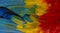Close up Colorful of Scarlet macaw bird`s feathers with red yellow orange and blue shades, exotic nature background and texture