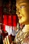 Close up colorful sculpture of Maitreya buddha