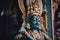 close-up of colorful statue of hindu deity in temple