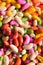 Close-up of colorful sugar coated fennel seed Indian candy filling background