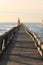 Close up on colorful wooden breakwater with lighthouse on atlantic coast, capbreton, france